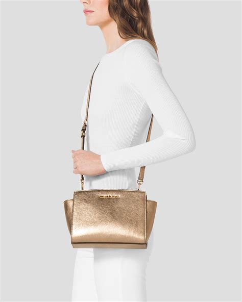 micheal michael kors medium messenger gold|michael kors manhattan medium satchel.